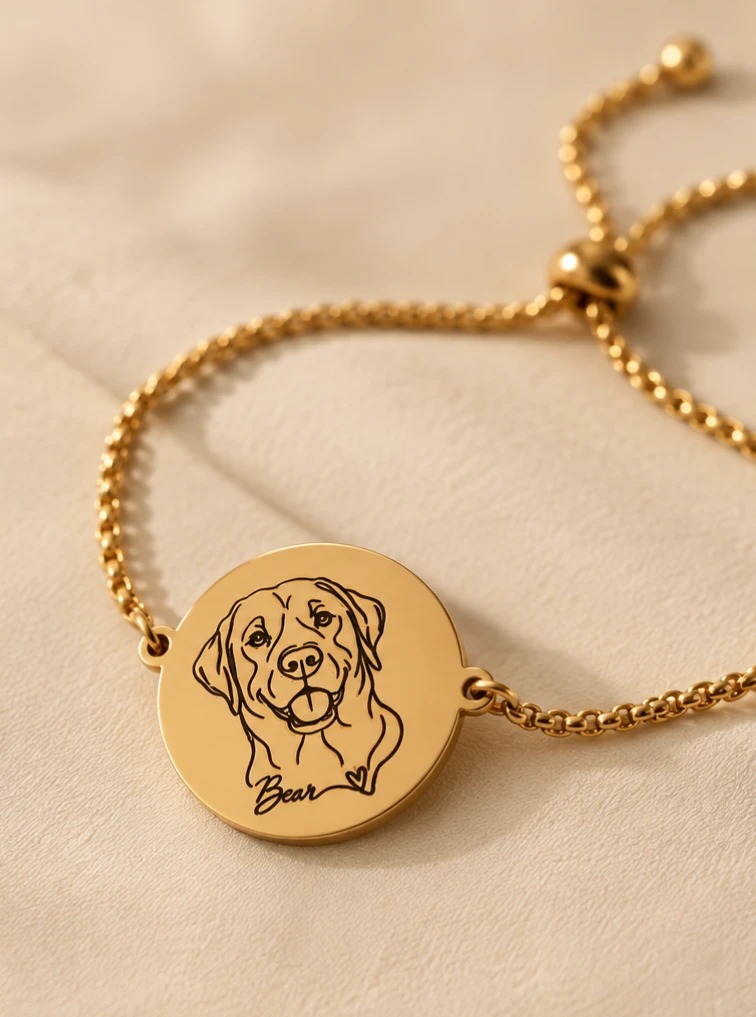 Gold Furever Charm bracelet engraved with a dog portrait and the name Bear