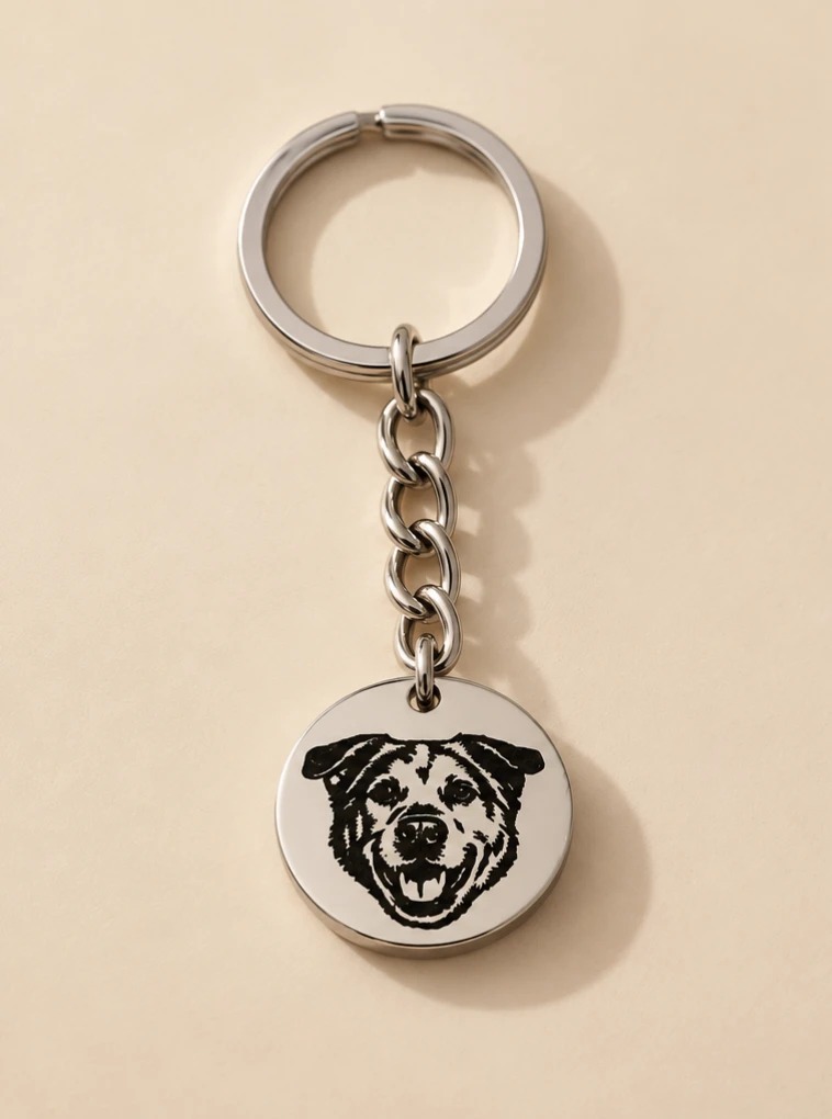 Silver circle Furever Charm on a keychain, engraved with a pet portrait