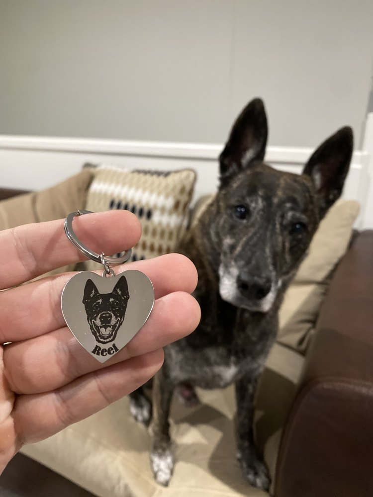 Reel with his engraved heart keychain